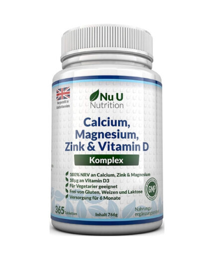 Un flacon blanc de Nu U Nutrition - Calcium Magnésium Zinc Vitamine D, 365 comprimés, adapté aux végétariens et exempt de gluten, de blé et de lactose.