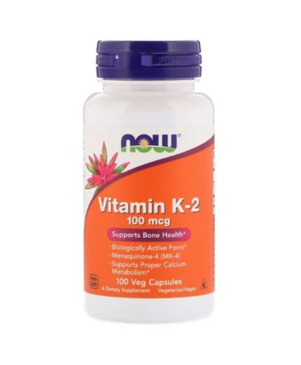 Une bouteille de Now Foods - Vitamine K2 100 mcg, 100 Gélules avec une étiquette orange et blanche.